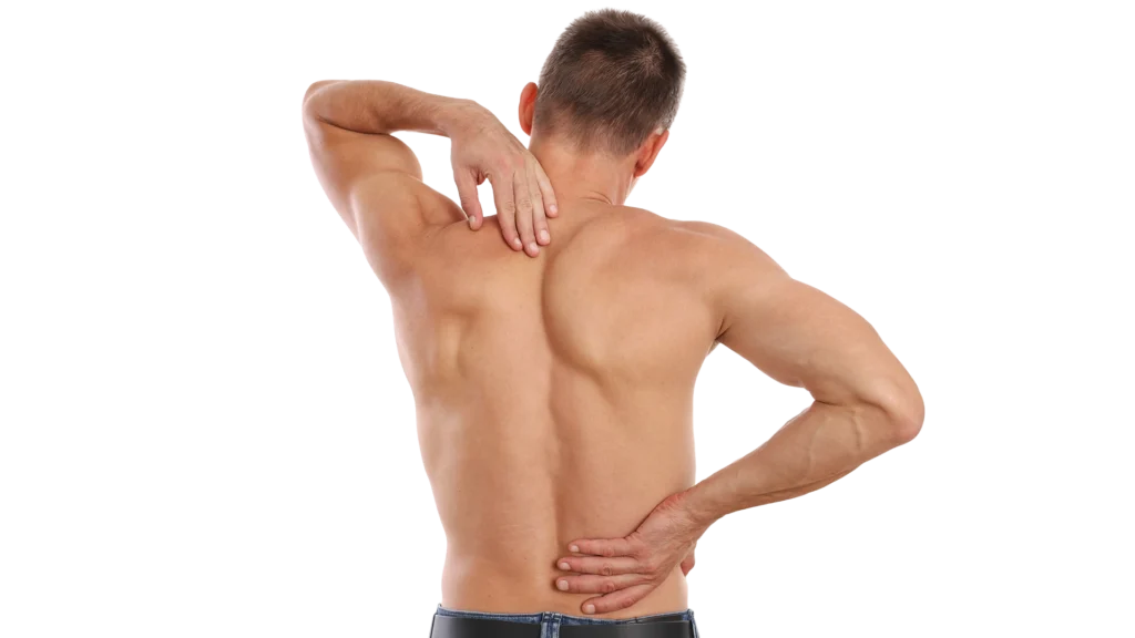 a man reaching for his back