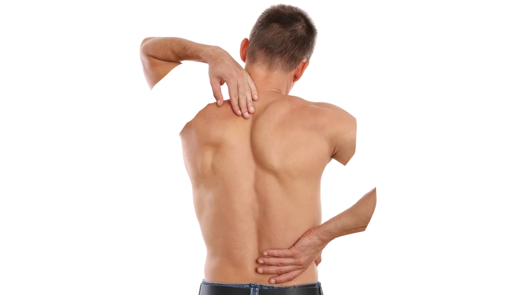 a man reaching for his back
